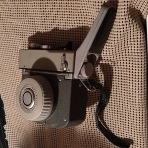 Sekonic Dualmatic -50 Vintage Spool Camera and original leather camera case.